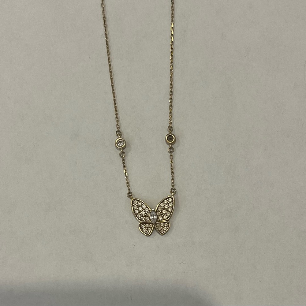 gold butterfly necklace. thin chain